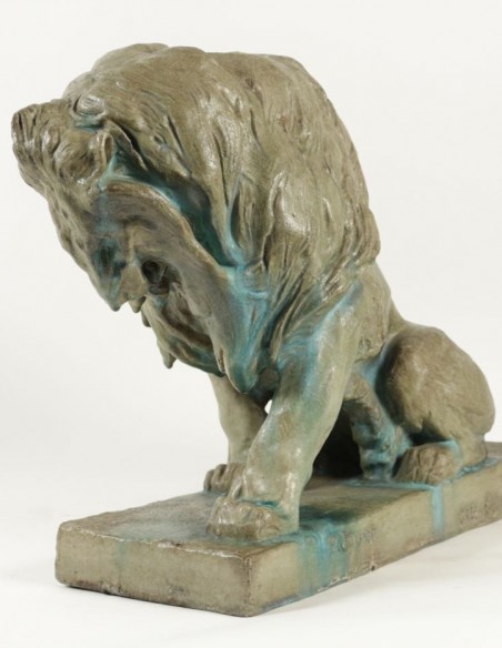 1095-Paul Jouve sculpture of a seated Lion in glazed stoneware