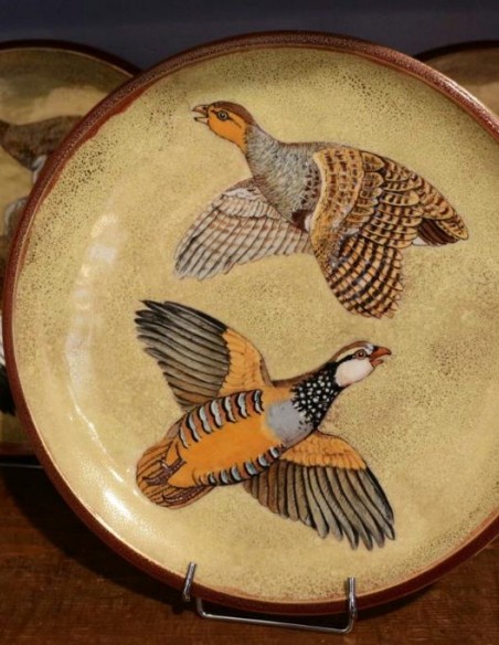 863-Series of 9 ceramic plates by Auguste Heiligenstein